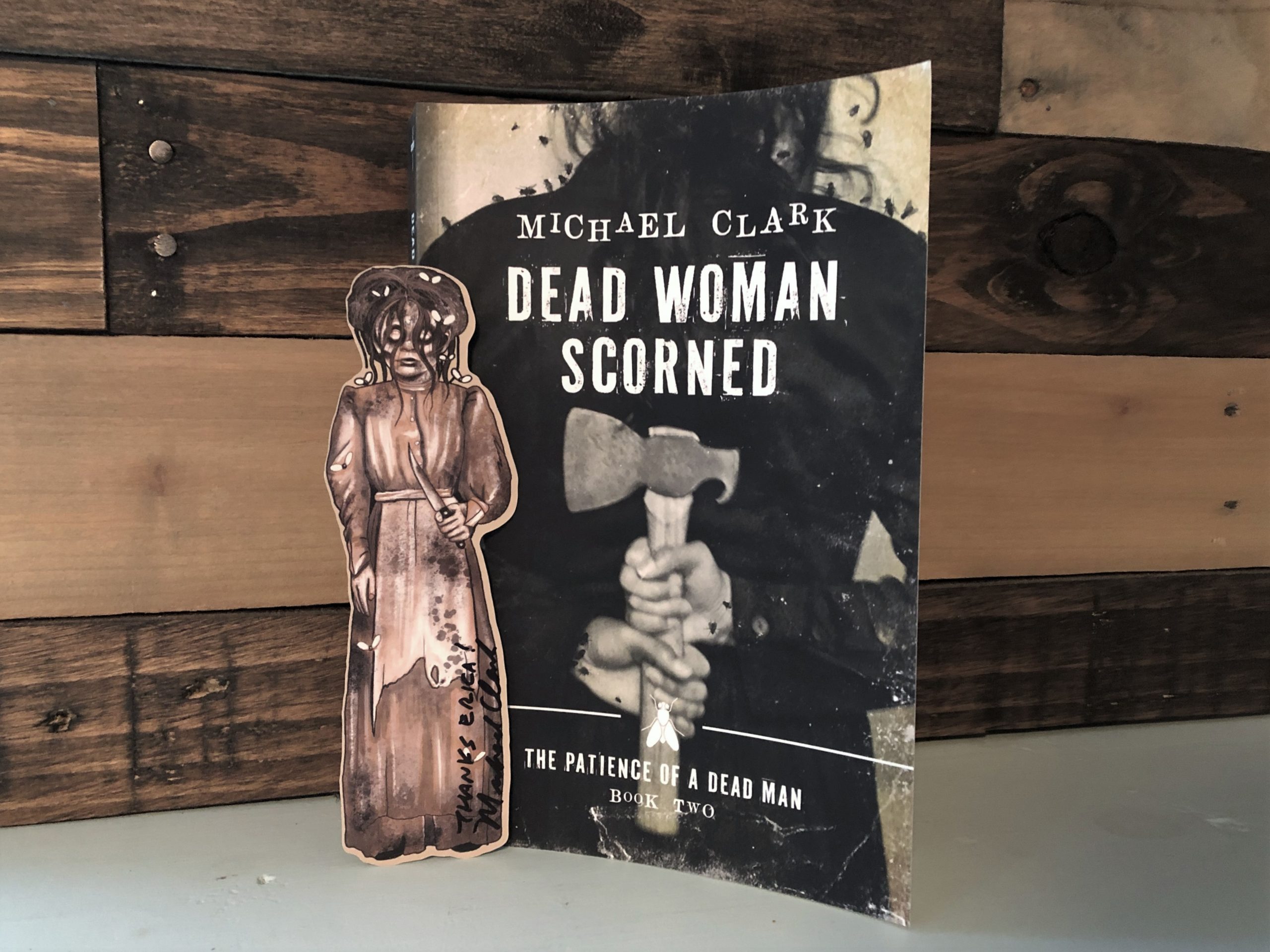 Dead Woman Scorned by Michael Clark book photo by Erica Robyn Reads