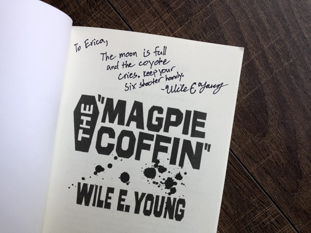 The Magpie Coffin by Wile E. Young Signature