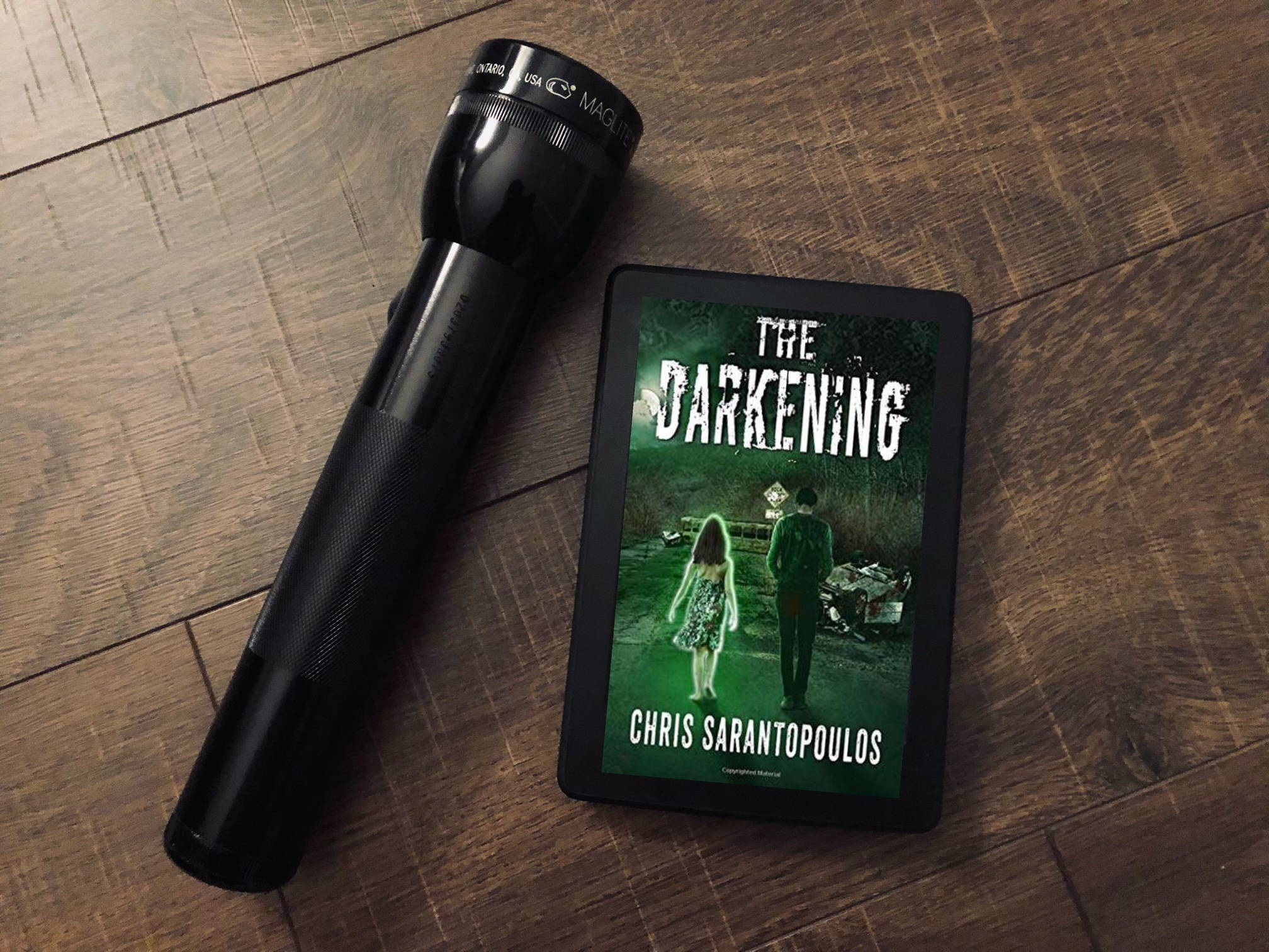 The Darkening by Chris Sarantopoulos book photo by Erica Robyn Reads