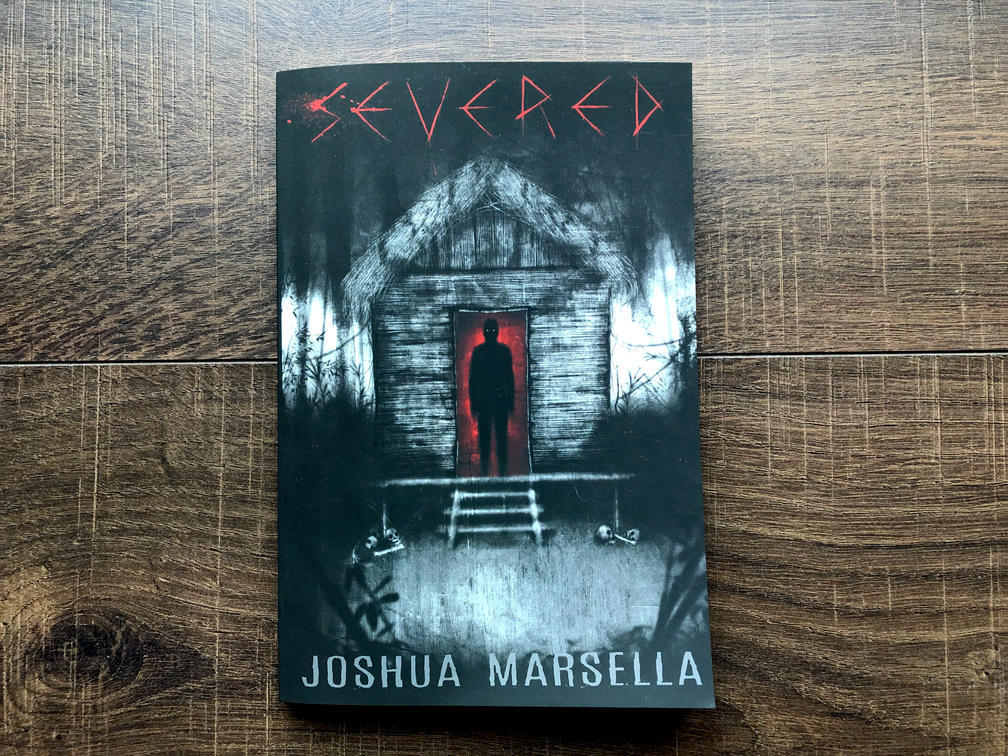Severed by Joshua Marsella book photo by Erica Robyn Reads