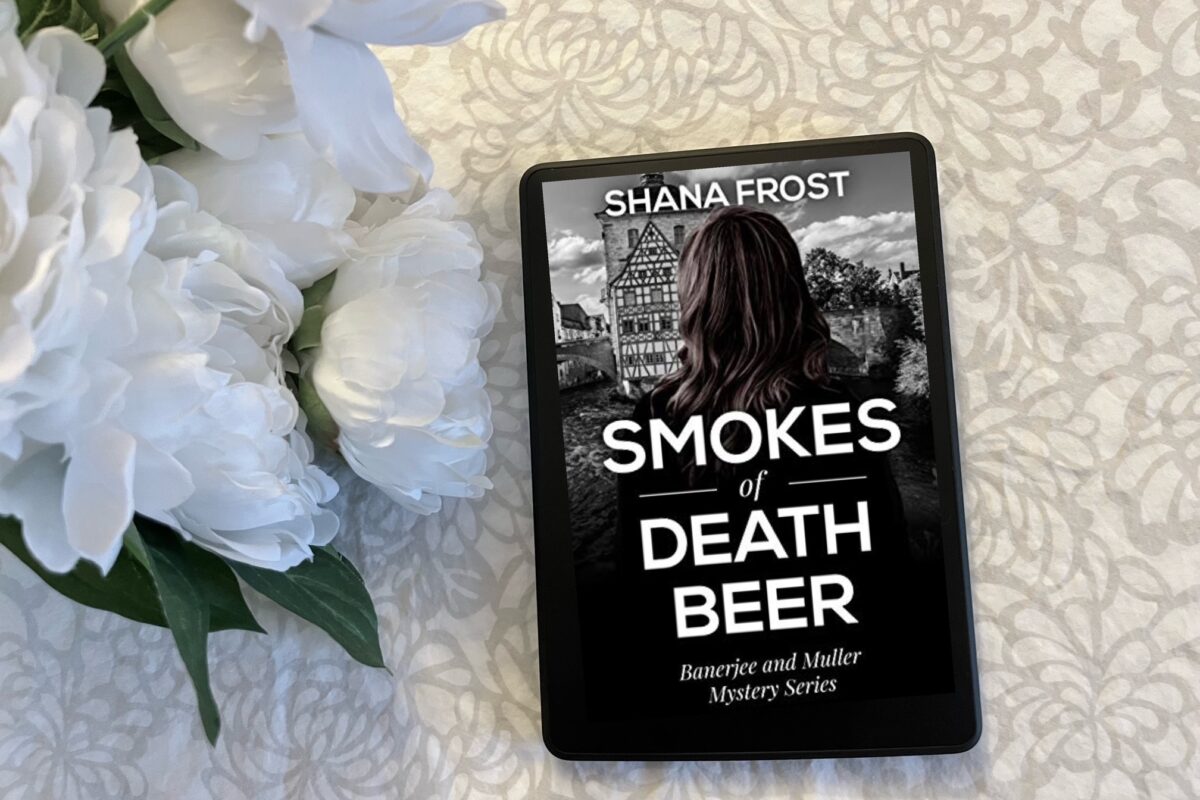 Smokes of Death Beer (Banerjee and Muller Mystery Series Book 1) by Shana Frost book review and book photo by Erica Robyn Reads