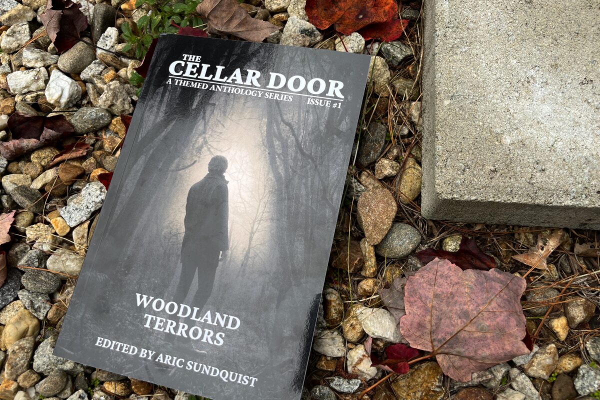 Woodland Terrors: The Cellar Door Issue #1 edited by Aric Sundquist book photo by Erica Robyn Reads