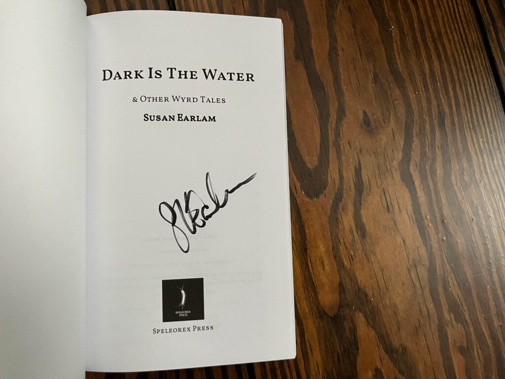 Signed copy of Dark is the Water by Susan Earlam book photo by Erica Robyn Reads