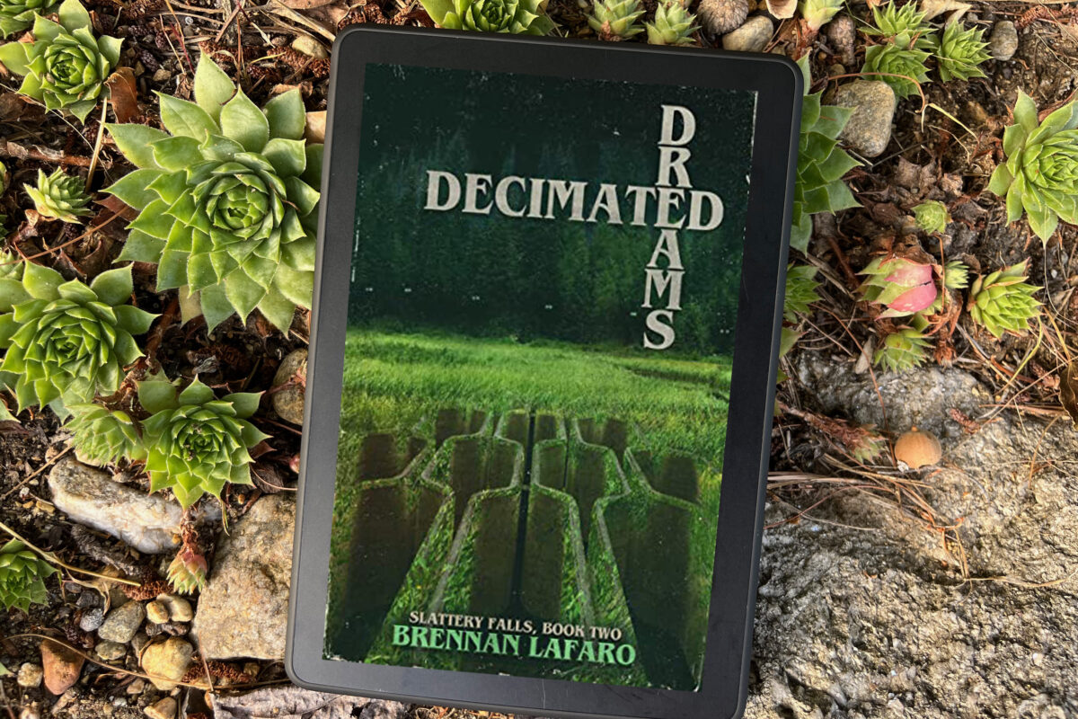 Decimated Dreams by Brennan LaFaro book photo by Erica Robyn Reads - book cover is a green underground maze that has been taken back by weeds