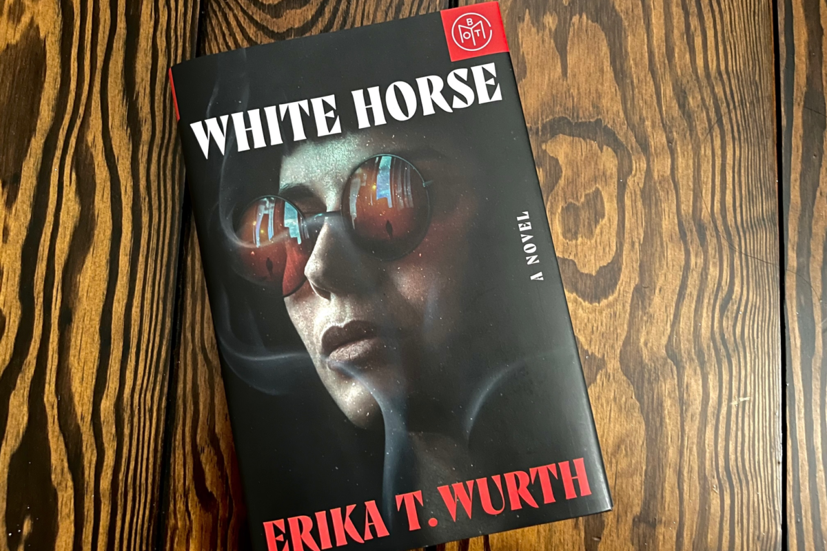 White Horse by Erika T. Wurth book photo by Erica Robyn Reads - book cover features a woman wearing sunglasses with smoke floating around her