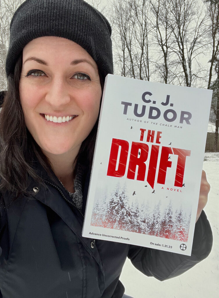 The Drift by C.J. Tudor book selfie of Erica Robyn Reads