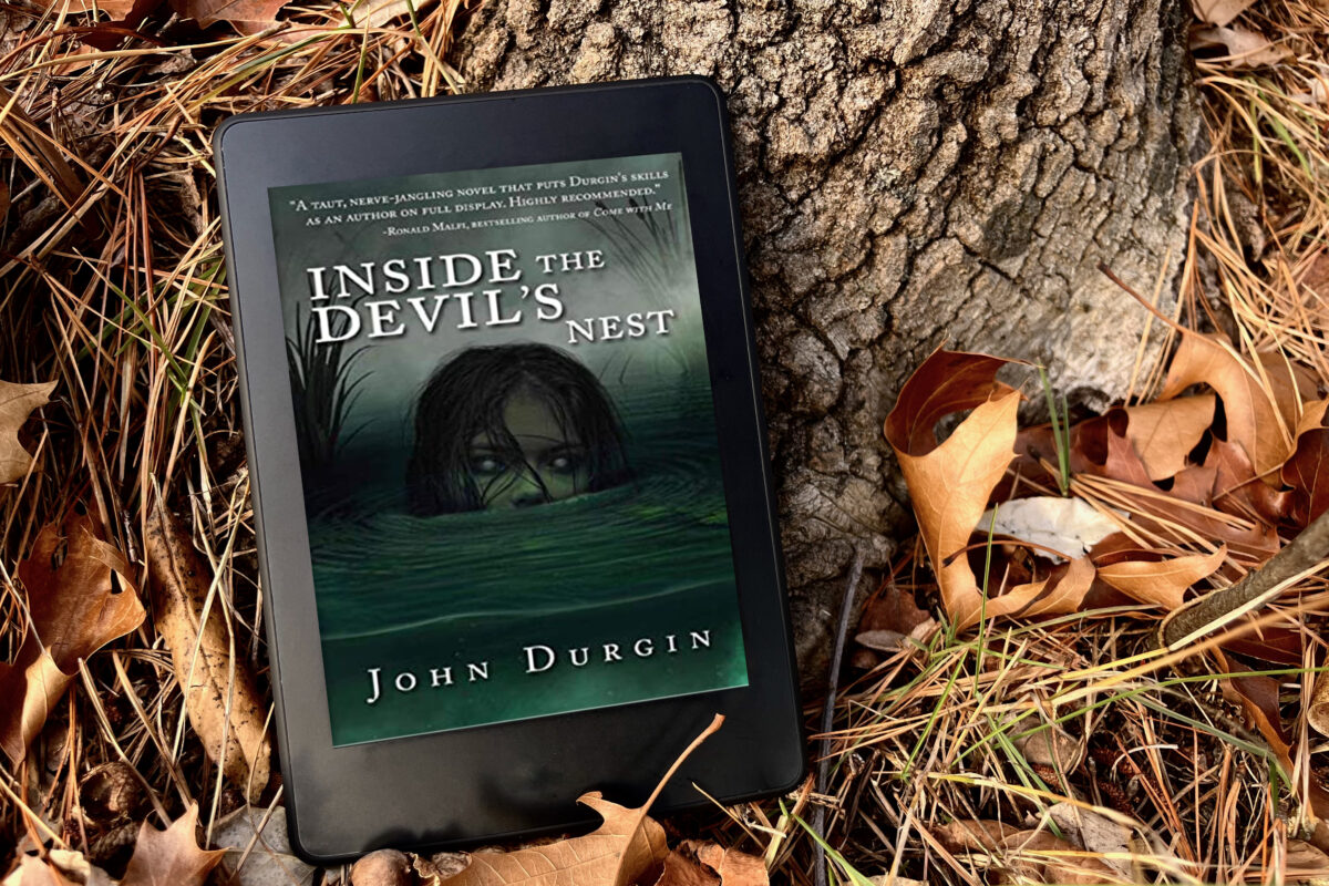 Inside The Devil's Nest by John Durgin book photo of terrifying girl in green water