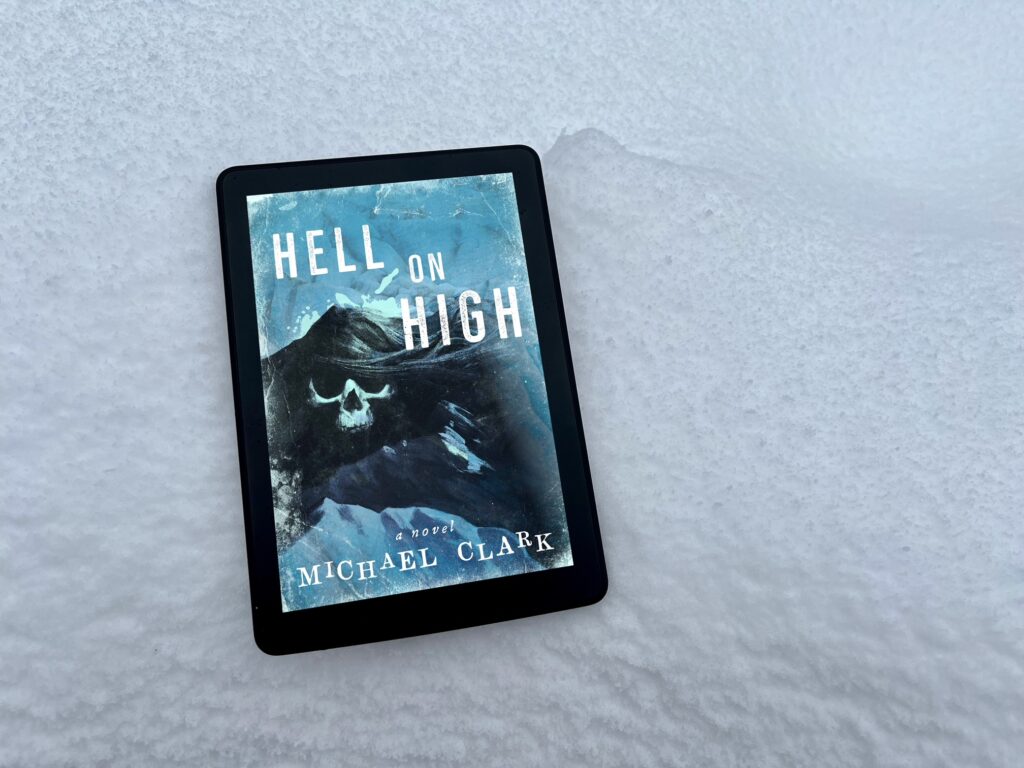 Hell On High by Michael Clark book photo by Erica Robyn Reads - a creepy mountain scene on the cover