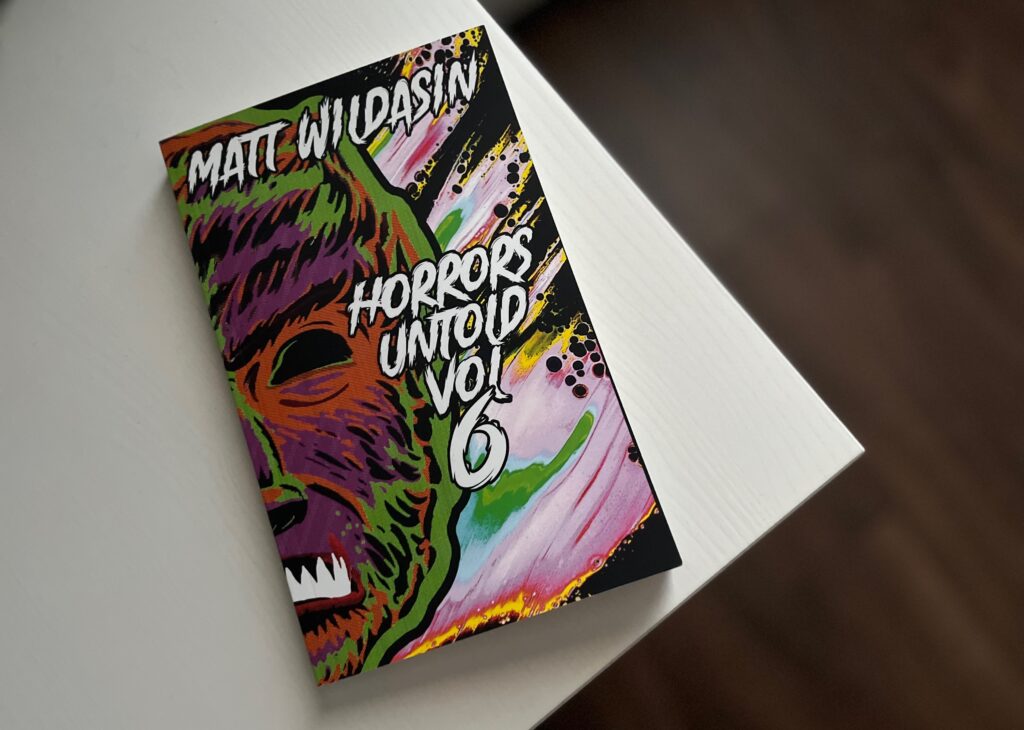 Horrors Untold Vol 6 by Matt Wildasin book photo by Erica Robyn Reads