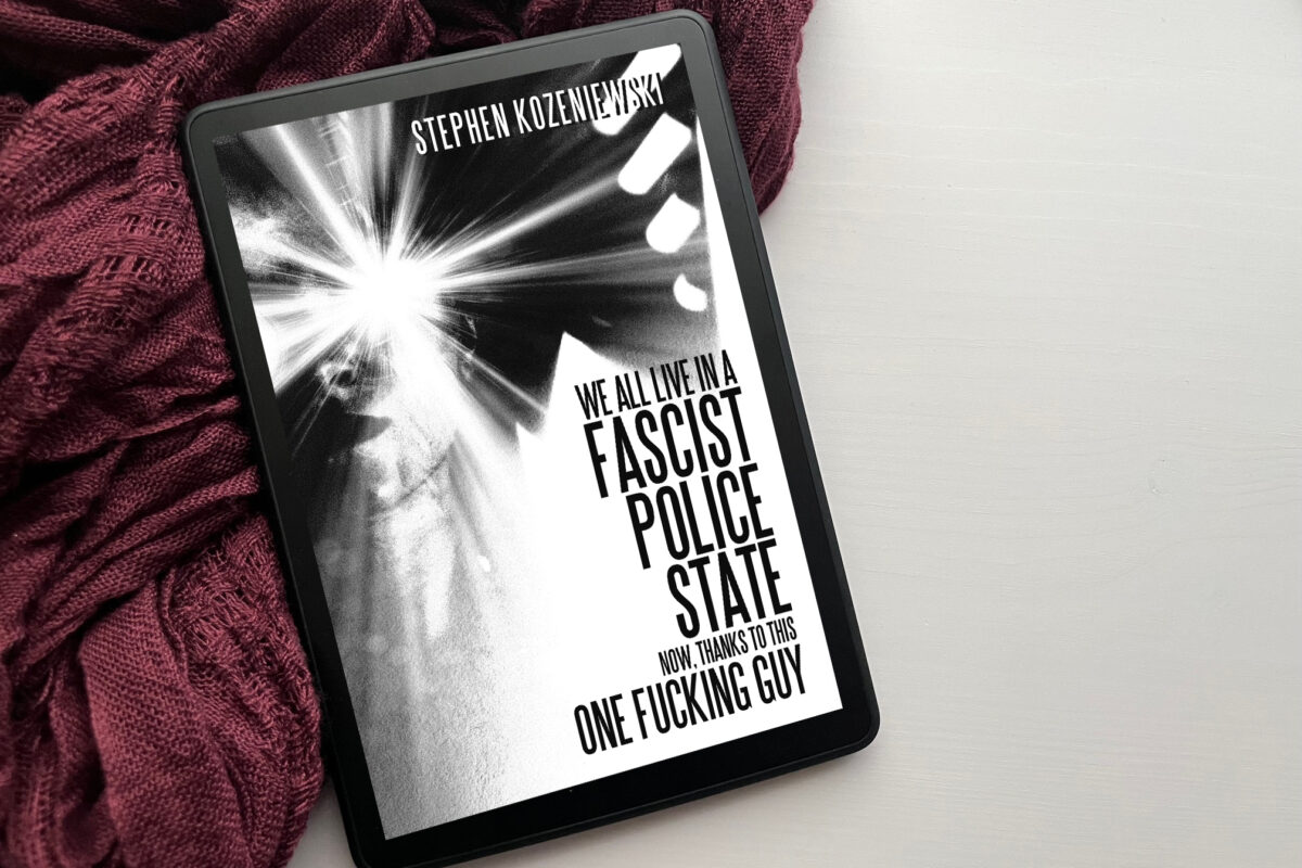 We All Live in a Fascist Police State Now, Thanks to This One Fucking Guy by Stephen Kozeniewski book photo by Erica Robyn Reads